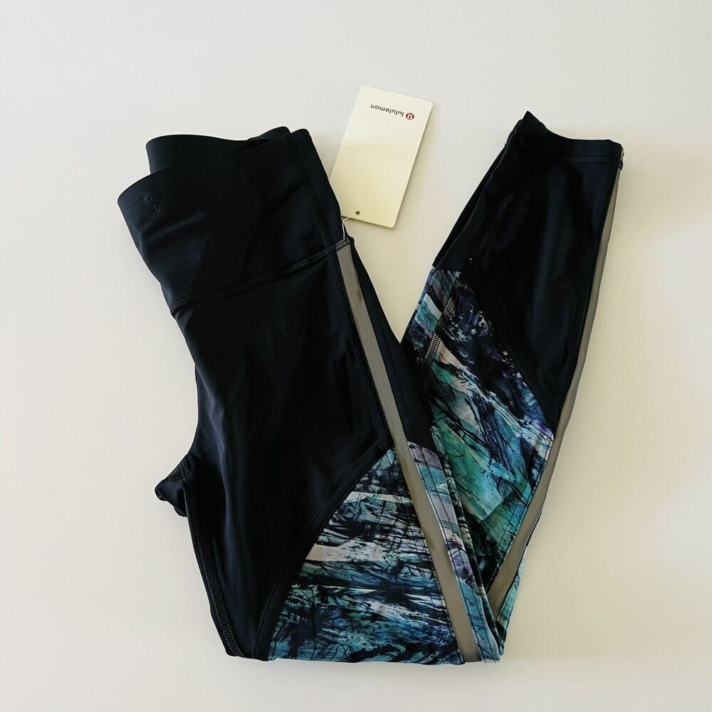 LULULEMON ATHLETICA Black Frozen Island Run to Reset Tight 25" Leggings - US 4